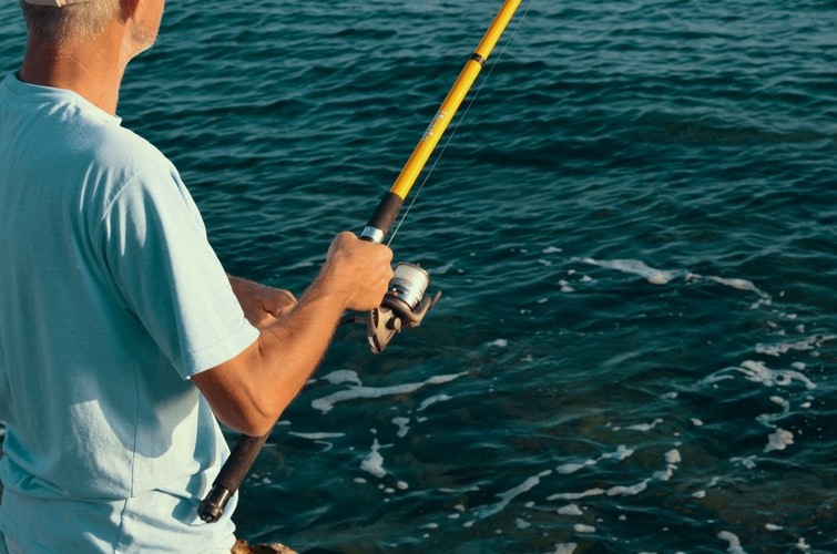 Pro Tips For Deep Sea Fishing In Albemarle 38ft. Yacht 1 An expert angler fishing off shore in an Albemarle 38 ft yacht