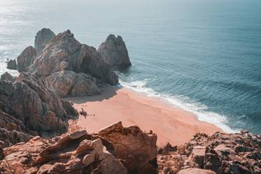 Things You Must Do on your Trip to Cabo 1 A rocky island near the sea