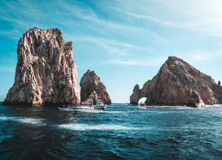 Perks of Booking a Charter Yacht 1 Photo of boats on ocean near rock formations