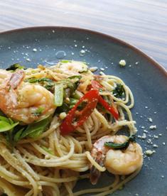 Perks of Booking a Charter Yacht 2 Shrimp pasta served on a grey plate