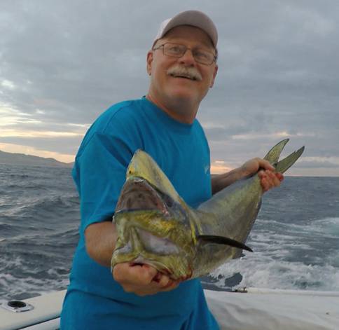 Here’s Why You Should Be Heading to Cabo San Lucas, NOW! 1 A tourist fishing in the deep waters of Cabo San Lucas.