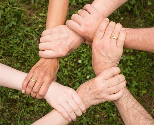 Reasons Why You Should Go For a Family Sailing Holiday 2 family holding hands while bonding